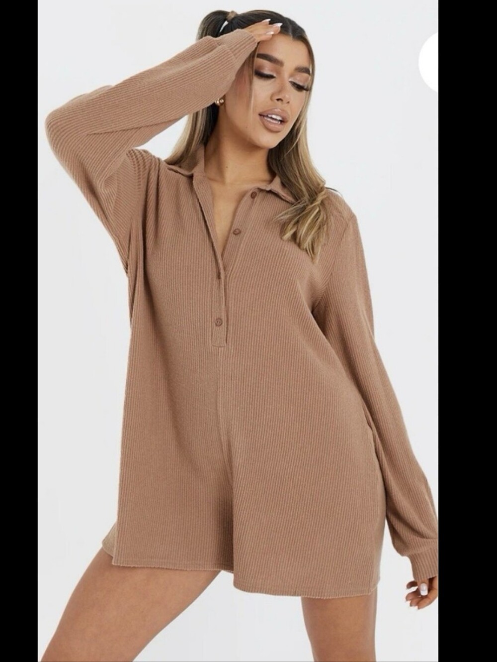 long-sleeve waffle knit lounge romper featuring a partial button-down henley